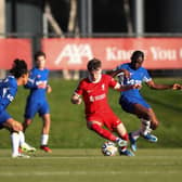 Ben Doak of Liverpool runs with the ball whilst under pressure from Alex Matos of Chelseaduring the Premier League 2 match between Liverpool FC U21 and Chelsea FC U21 at The Kirkby Academy on December 17, 2023 in Kirkby, England. (Photo by Liverpool FC/Liverpool FC via Getty Images)