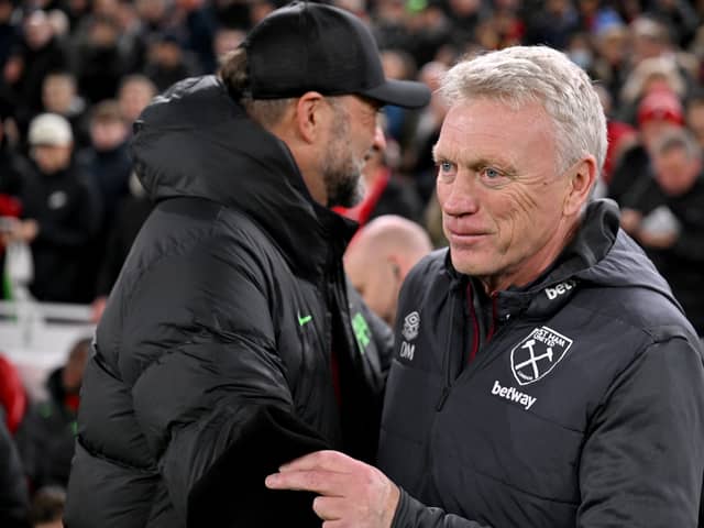 Jurgen Klopp manager of Liverpool with David Moyes manager of West Ham United before the Carabao Cup Quarter Final match between Liverpool and West Ham United at Anfield on December 20, 2023 in Liverpool, England. (Photo by Andrew Powell/Liverpool FC via Getty Images)