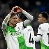 Darwin Nunez of Liverpool celebrates after scoring the opening goal during the Premier League match between Burnley FC and Liverpool FC at Turf Moor on December 26, 2023 in Burnley, England. (Photo by Andrew Powell/Liverpool FC via Getty Images)