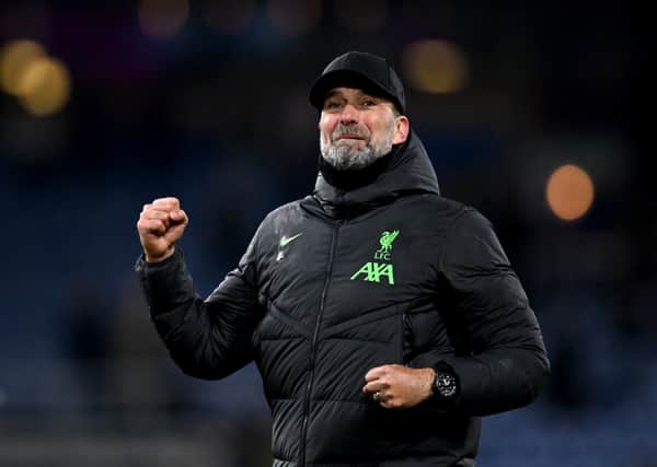 Jurgen Klopp manager of Liverpool showing his appreciation to the fans at the end of the Premier League match between Burnley FC and Liverpool FC at Turf Moor on December 26, 2023 in Burnley, England. (Photo by Andrew Powell/Liverpool FC via Getty Images)