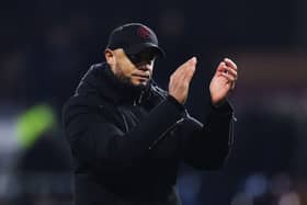  Vincent Kompany, Manager of Burnley, looks dejected as he applauds the fans at full-time following their team's defeat in the Premier League match between Burnley FC and Liverpool FC at Turf Moor on December 26, 2023 in Burnley, England. (Photo by Jan Kruger/Getty Images)
