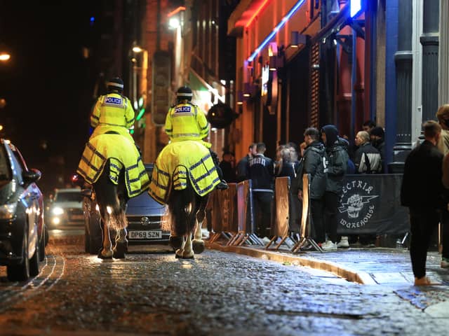 Police patrol in the centre of Liverpool. Image: LINDSEY PARNABY/AFP via Getty Images