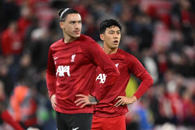 Liverpool pair Darwin Nunez and Wataru Endo. (Photo by OLI SCARFF/AFP via Getty Images)