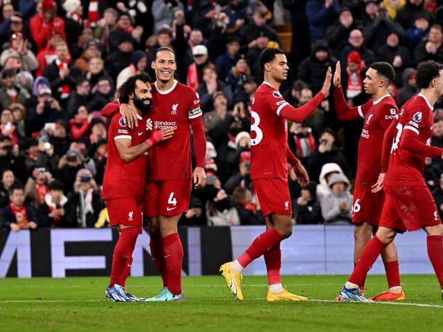 Mo Salah and Virgil van Dijk celebrate in Liverpool's win over Newcastle. (Photo by Andrew Powell/Liverpool FC via Getty Images)