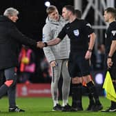 Crystal Palace manager Roy Hodgson shakes hands with Chris Kavanagh after his side's draw against Everton. (Photo by GLYN KIRK/AFP via Getty Images)