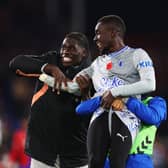 Everton midfielder Idrissa Gana Gueye, right, with Amadou Onana. (Photo by Clive Rose/Getty Images)