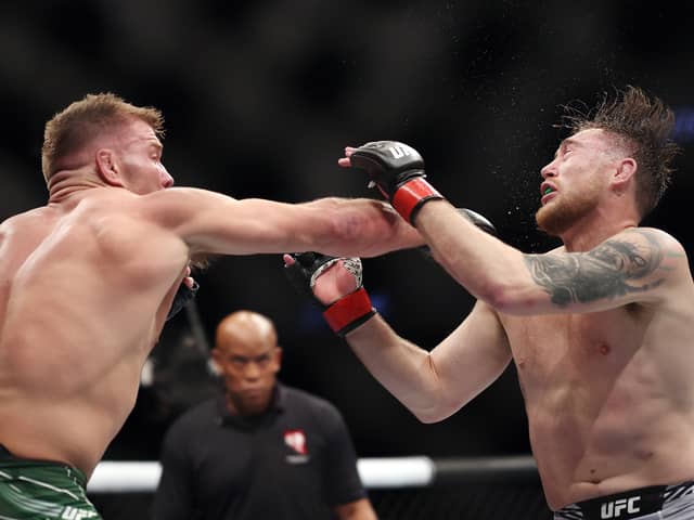 Dricus Du Plessis of South Africa punches Darren Till of England in a middleweight fight during the UFC 282 event at T-Mobile Arena on December 10, 2022 in Las Vegas, Nevada. Image: Sean M. Haffey/Getty Images