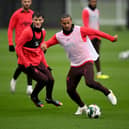 Calvin Ramsay, left, in Liverpool training.  (Photo by Andrew Powell/Liverpool FC via Getty Images)