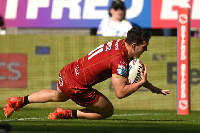 Matt Whitley dives over to score a try during the Betfred Super League Magic Weekend match between Wigan Warriors and Catalans Dragons at St James' Park on June 03, 2023 in Newcastle upon Tyne, England. Photo: Stu Forster/Getty Images