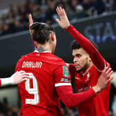  Luis Diaz of Liverpool celebrates scoring his team's first goal with teammate Darwin Nunez during the Carabao Cup Semi Final Second Leg match between Fulham and Liverpool at Craven Cottage on January 24, 2024 in London, England. (Photo by Clive Rose/Getty Images)