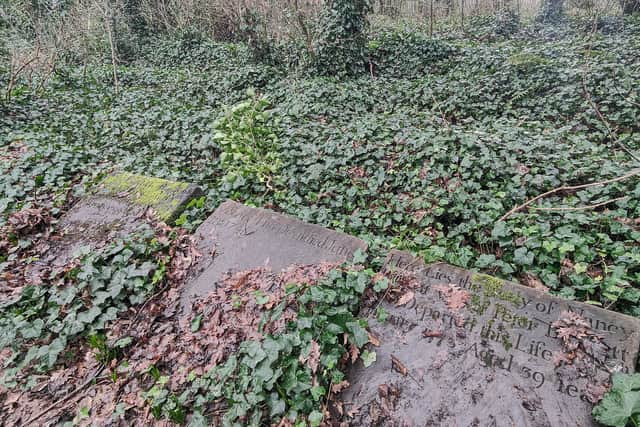Partially uncovered gravestones at Rice Lane Farm. Image: Jonathon Wild/Rice Lane Farm/Liverpool Parish Church