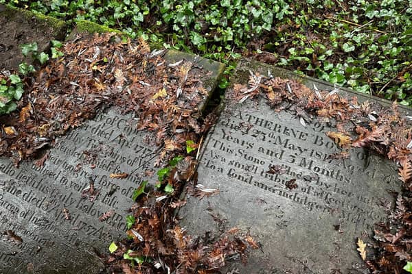 Partially uncovered gravestones at Rice Lane Farm. Image: Jonathon Wild/Rice Lane Farm/Liverpool Parish Church