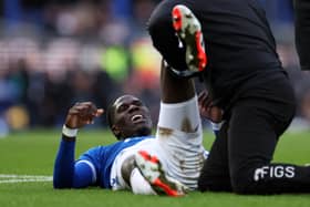 Amadou Onana of Everton receives medical treatment during the Emirates FA Cup Fourth Round match between Everton and Luton Town at Goodison Park on January 27, 2024 in Liverpool, England. (Photo by Alex Livesey/Getty Images)