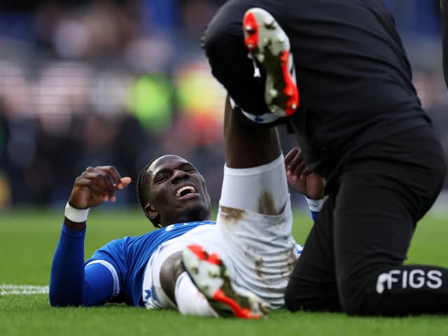 Amadou Onana of Everton receives medical treatment during the Emirates FA Cup Fourth Round match between Everton and Luton Town at Goodison Park on January 27, 2024 in Liverpool, England. (Photo by Alex Livesey/Getty Images)