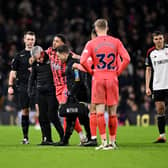 Arnaut Danjuma of Everton is assisted by medical staff as he leaves the field injured during the Premier League match between Fulham FC and Everton FC at Craven Cottage on January 30, 2024 in London, England. (Photo by Mike Hewitt/Getty Images)