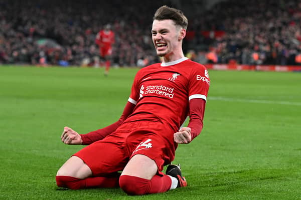 Conor Bradley of Liverpool celebrates after scoring the second goal during the Premier League match between Liverpool FC and Chelsea FC at Anfield on January 31, 2024 in Liverpool, England. (Photo by John Powell/Liverpool FC via Getty Images)