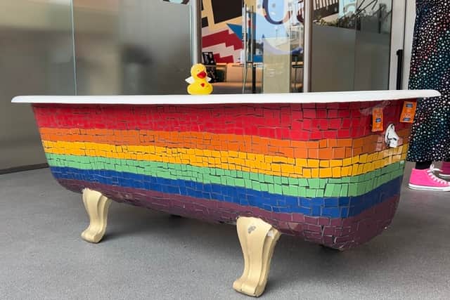 The Dip In To Pride bathtub on show at the Museum of Liverpool. 