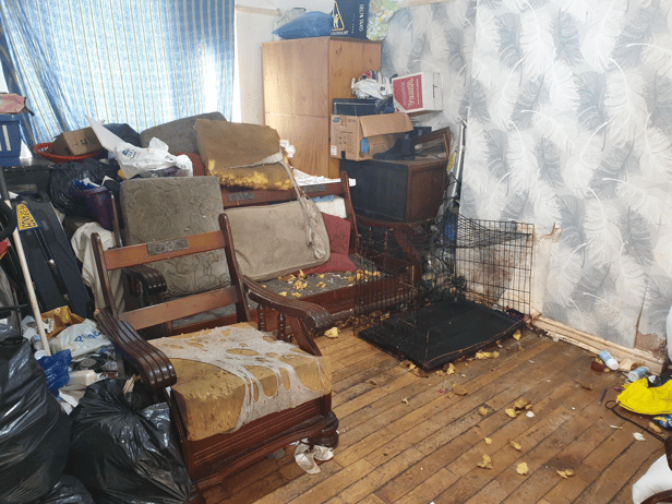 Police photographs show the shocking conditions the dog lived in.