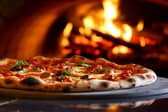 A Neapolitan pizza cooked in wood-fired oven. Image: Polonio Video/stock.adobe