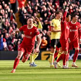 Diogo Jota of Liverpool celebrates after scoring the opening goal during the Premier League match between Liverpool FC and Burnley FC at Anfield on February 10, 2024 in Liverpool, England. (Photo by Andrew Powell/Liverpool FC via Getty Images)