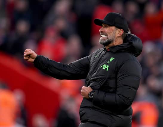  Jurgen Klopp manager of Liverpool showing his appreciation to the fans at the end of the Premier League match between Liverpool FC and Burnley FC at Anfield on February 10, 2024 in Liverpool, England. (Photo by Andrew Powell/Liverpool FC via Getty Images)