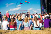 Teenagers at a summer music festival. Image: Halfpoint - stock.adobe.com