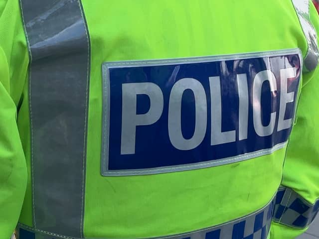 Two people have been charged after a child was bitten by an XL Bully dog in Bootle