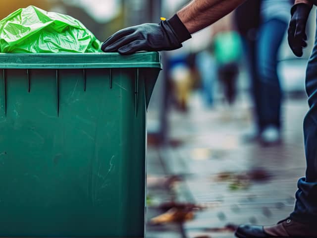 Green bin collection in the city. Image: Michal/stock.adobe