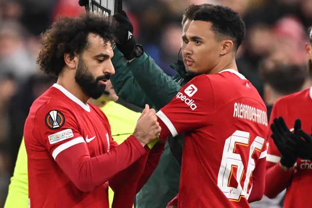 Liverpool pair Mo Salah and Trent Alexander-Arnold.  (Photo by OLI SCARFF/AFP via Getty Images)