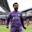  Mohamed Salah of Liverpool celebrates after scoring his team's third goal during the Premier League match between Brentford FC and Liverpool FC at Gtech Community Stadium on February 17, 2024 in Brentford, England. (Photo by Ryan Pierse/Getty Images)