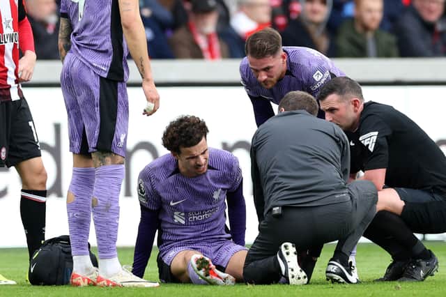 Curtis Jones suffered an injury in Liverpool's victory over Brentford.  (Photo by ADRIAN DENNIS/AFP via Getty Images)