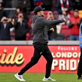 Jurgen Klopp manager of Liverpool showing his appreciation to the fans at the end of the Premier League match between Brentford FC and Liverpool FC at Brentford Community Stadium on February 17, 2024 in Brentford, England. (Photo by Andrew Powell/Liverpool FC via Getty Images)