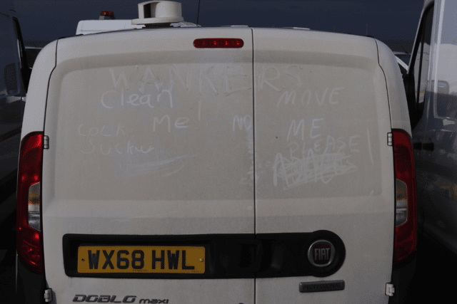 Images taken by local photographer, Ian Fairbrother show dozens of the white vehicles parked in rows along the promenade on Tuesday (February 20) with one showing the words 'wankers' and 'move me please' written in the vehicle's dust. Image: Ian Fairbrother