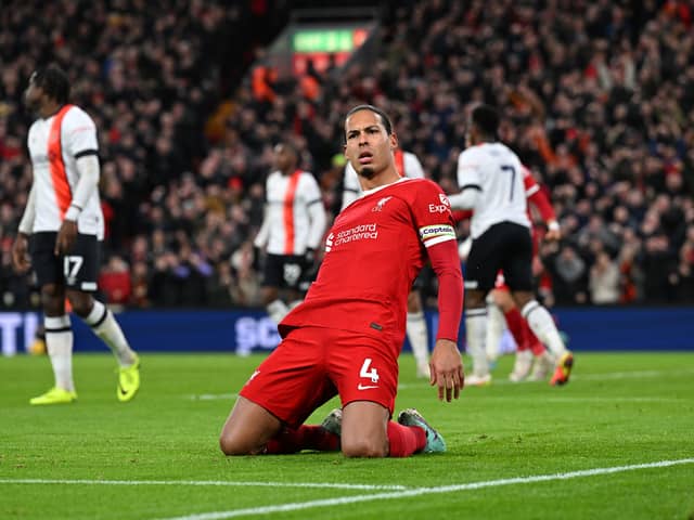 Virgil van Dijk captain of Liverpool celebrates after scoring the first Liverpool goal during the Premier League match between Liverpool FC and Luton Town at Anfield on February 21, 2024 in Liverpool, England. (Photo by John Powell/Liverpool FC via Getty Images)