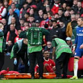  Ryan Gravenberch of Liverpool prepares to be stretchered off after picking up an injury after a tackle by Moises Caicedo of Chelsea (not pictured) during the Carabao Cup Final match between Chelsea and Liverpool at Wembley Stadium on February 25, 2024 in London, England. (Photo by Mike Hewitt/Getty Images)