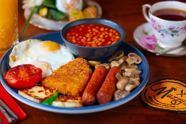 Renowned for its huge delicious fry-ups, such as the Bohemian Rapsody, the family cafe has an impressive five out five star rating on Google reviews. Image: Muzzy's Bebington