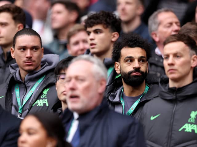 Darwin Nunez and Mohamed Salah of Liverpool look on from the substitutes bench prior to the Carabao Cup Final match between Chelsea and Liverpool at Wembley Stadium on February 25, 2024 in London, England. (Photo by Julian Finney/Getty Images)