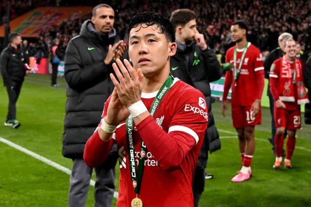 Wataru Endo of Liverpool at the end of the Carabao Cup Final between Chelsea and Liverpool at Wembley Stadium on February 25, 2024 in London, England. (Photo by Andrew Powell/Liverpool FC via Getty Images)