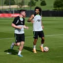 Liverpool pair Andy Robertson and Mo Salah. (Photo by Andrew Powell/Liverpool FC via Getty Images) 