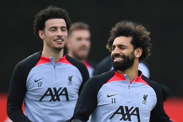 Liverpool pair Curtis Jones and Mo Salah. (Photo by John Powell/Liverpool FC via Getty Images)