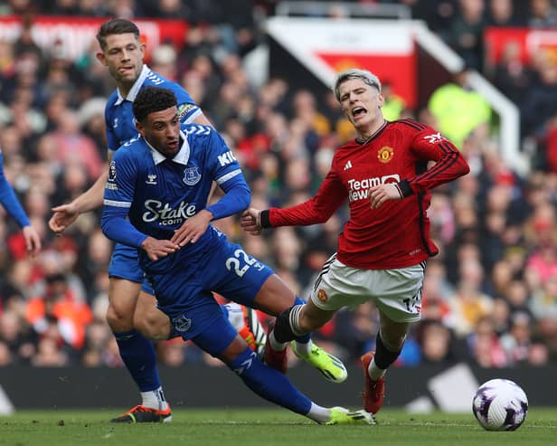 Alejandro Garnacho of Manchester United is fouled by Ben Godfrey of Everton during the Premier League match between Manchester United and Everton FC at Old Trafford on March 09, 2024 in Manchester, England. (Photo by Matthew Peters/Manchester United via Getty Images)