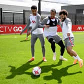 Joel Matip and Mohamed Salah of Liverpool during a training session. (Photo by Andrew Powell/Liverpool FC via Getty Images)