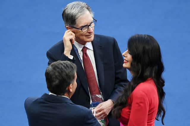 Linda Pizzuti, right, with husband and FSG principal owner John Henry. (Photo by Matthias Hangst/Getty Images)