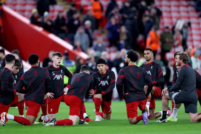 Liverpool's squad warm-up. (Photo by Alex Livesey/Getty Images)