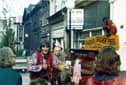 Barrel Organ Phil, with a monkey, on Bold Street, Liverpool, in 1975. Image: Rodhullandemu/CC BY 3.0/commons.wikimedia