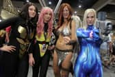 Women play the parts of Wasp from Marvel Comics, Pixie from X-Men, Red Sonja from Marvel Comics and Samus from Nintendo during Comic Con. Image: BILL WECHTER/AFP via Getty Images
