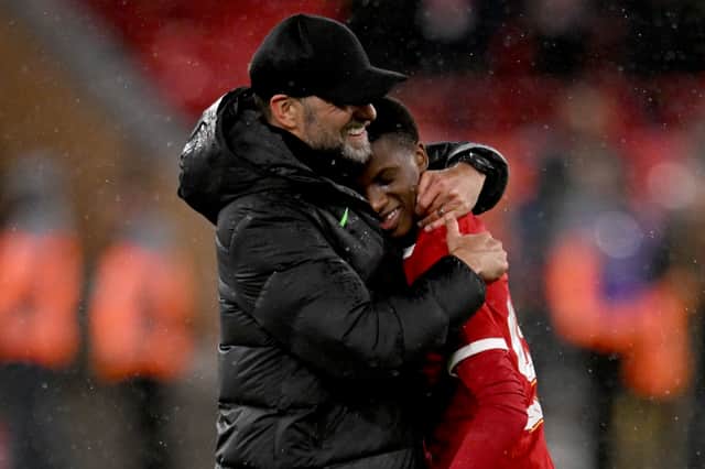 Jurgen Klopp manager of Liverpool embracing Trey Nyoni of Liverpool at the end of the Emirates FA Cup Fifth Round match between Liverpool and Southampton at Anfield on February 28, 2024 in Liverpool, England. (Photo by Andrew Powell/Liverpool FC via Getty Images)