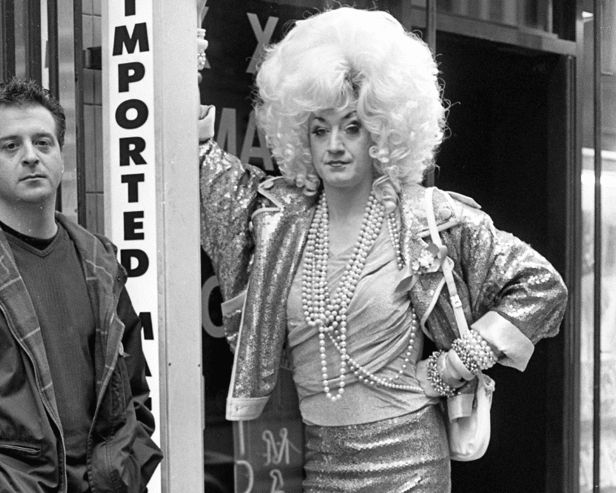 Comedians Mark Thomas and Paul O'Grady (in character as Lily Savage), Soho, London, United Kingdom, 1993. Image: Martyn Goodacre/Getty Images