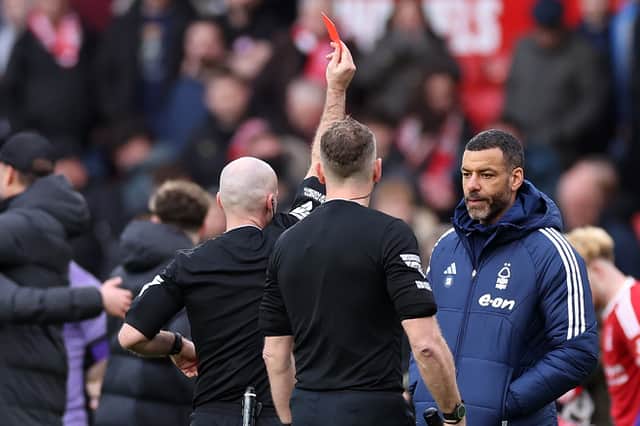 Steven Reid, Coach of Nottingham Forest is shown a red card by Match Referee Paul Tierney following the Premier League match between Nottingham Forest and Liverpool FC at the City Ground on March 02, 2024 in Nottingham, England. (Photo by Catherine Ivill/Getty Images)
