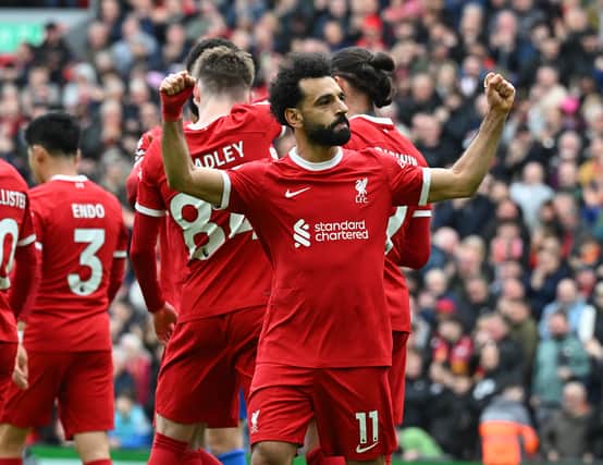 Mo Salah celebrates scoring for Liverpool against Brighton. (Photo by John Powell/Liverpool FC via Getty Images)